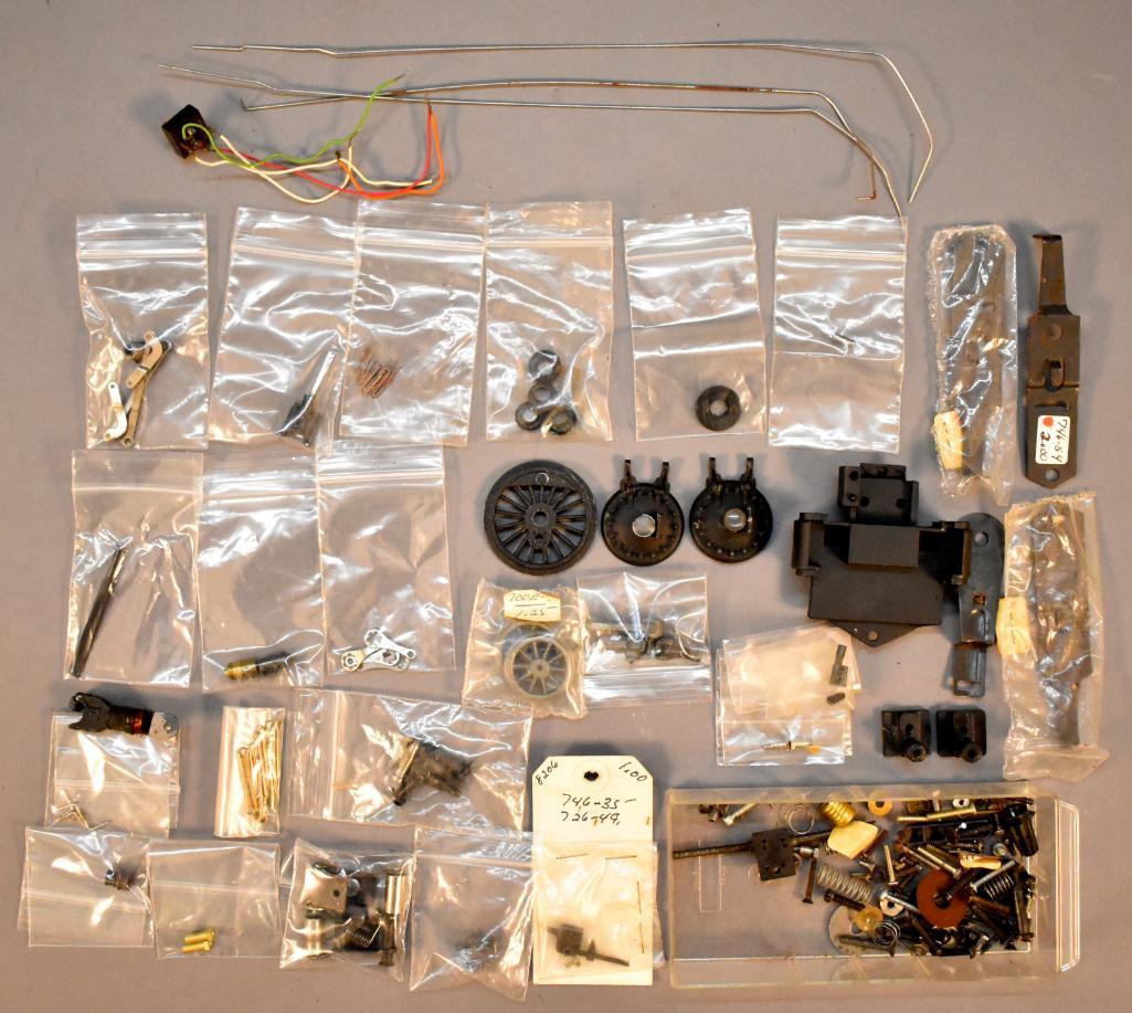 Group of reproduction and original Lionel 700E parts: Group of reproduction and original Lionel 700E parts, most are reproduction from what we can tell. Sold as-is as seen in the photos with no returns.