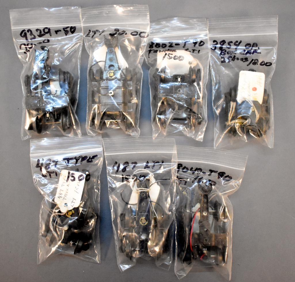 Group of MPC era Lionel trucks and a postwar 3854 truck (1 of 4)