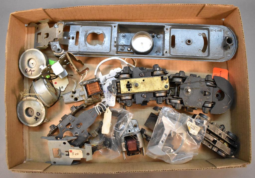 Great group of Lionel postwar O F-3 parts: Great group of Lionel postwar O F-3 parts to include a frame, two motors, three horns, two trucks and more as seen in the photos.
