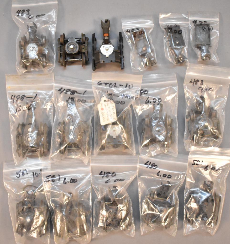 Group of Lionel postwar O freight and passenger trucks (1 of 7)