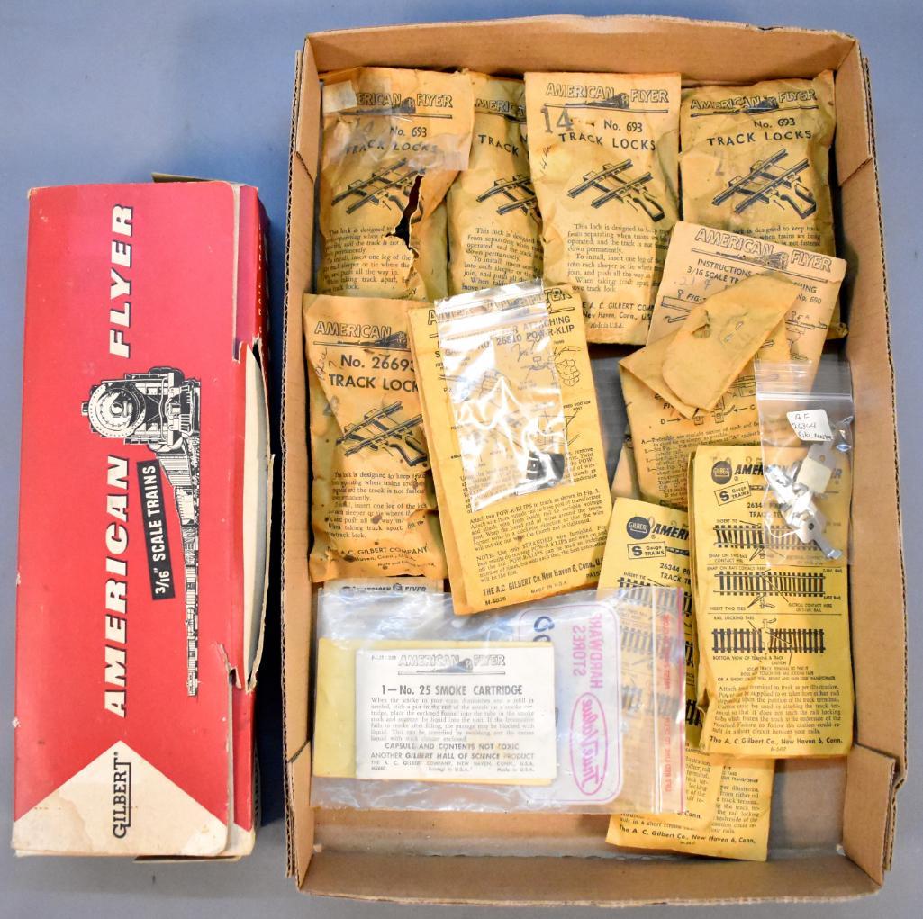 Group of American Flyer track locks and Pikemaster (1 of 7)
