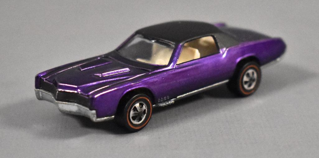 Redline Hot Wheels US Purple Custom Eldorado Loose: Redline Hot Wheels US Purple Custom Eldorado Loose Near mint car with exceptional purple paint and white interior. There are a few scattered tone spots, mainly on the trunk. Very nice wheel chrome, th