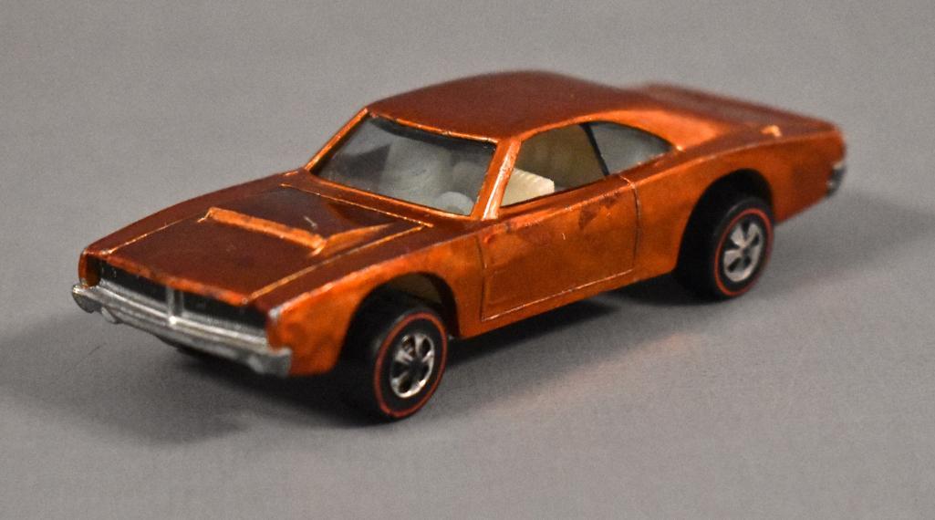 Redline Hot Wheels Orange Custom Charger Loose: Redline Hot Wheels Orange Custom Charger Loose This car is very clean with just light wear to the extreme top corners of the body, the paint is nice but has light swirly tone throughout. Excellent whe