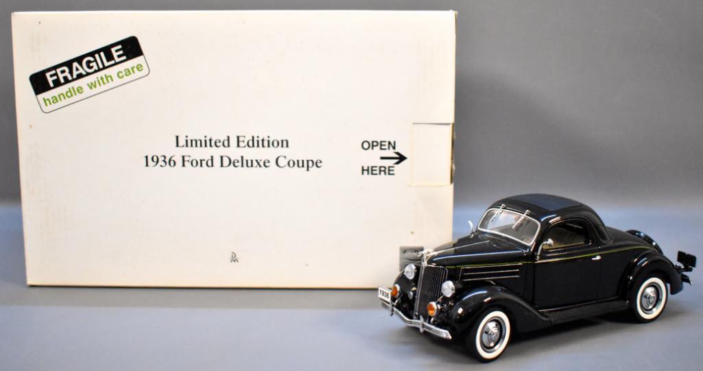 Danbury Mint 1936 Ford Coupe Black Limited #1898 of: Danbury Mint 1936 Ford Coupe Black Limited #1898 of 5000. Has a plaque showing the serial number mounted to the car. Car is excellent except for the mirror face is missing on the passenger side of the