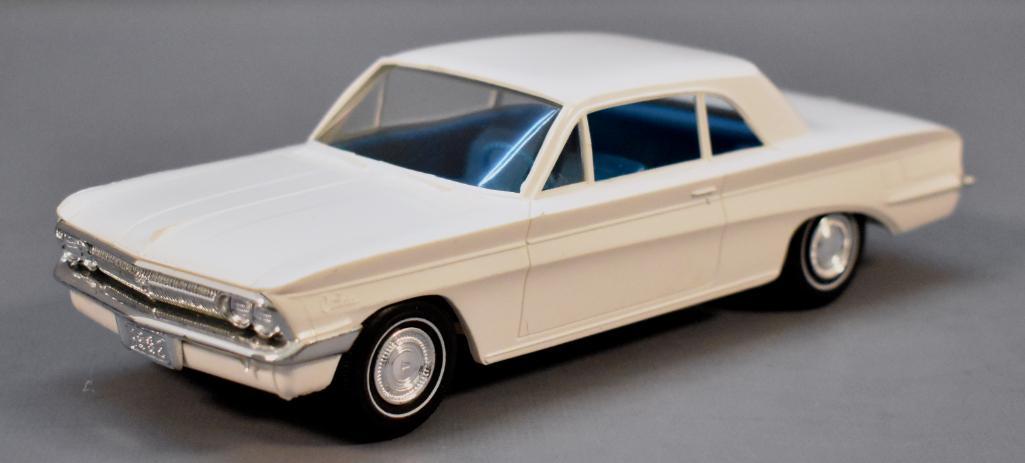 X-EL 1962 Oldsmobile Cutlass promo car Jo-Han: X-EL 1962 Oldsmobile Cutlass promo car Jo-Han reproduction, solid white in near mint condition as seen in the photos.
