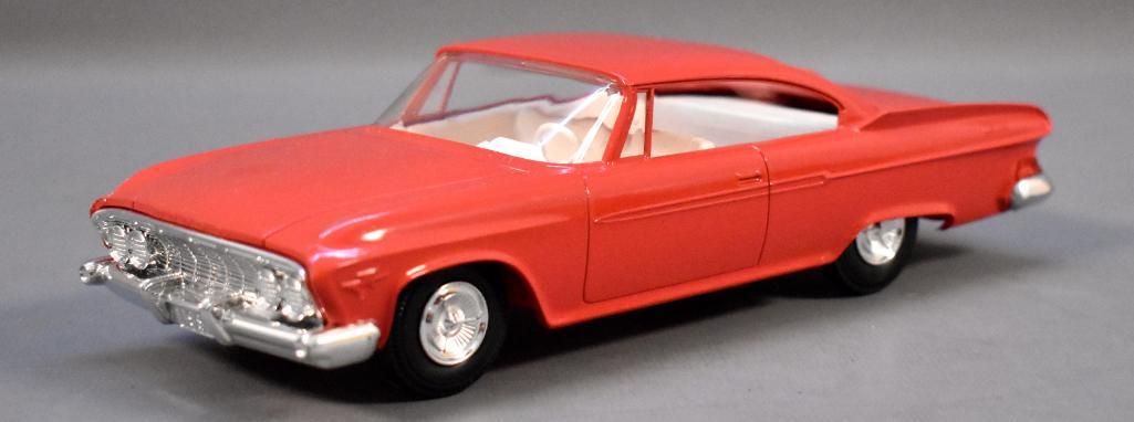 X-EL 1961 Dodge Phoenix promo car Jo-Han reproduction: X-EL 1961 Dodge Phoenix promo car Jo-Han reproduction, solid coral in excellent to near mint condition as seen in the photos.