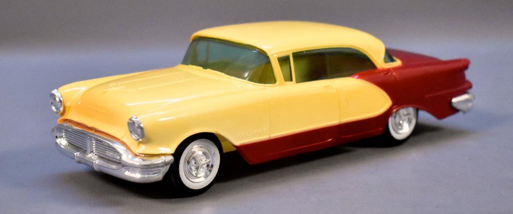 X-EL 1956 Oldsmobile Ninety Eight Holiday promo car: X-EL 1956 Oldsmobile Ninety Eight Holiday promo car Jo-Han reproduction, yellow over maroon in excellent to near mint condition as seen in the photos.