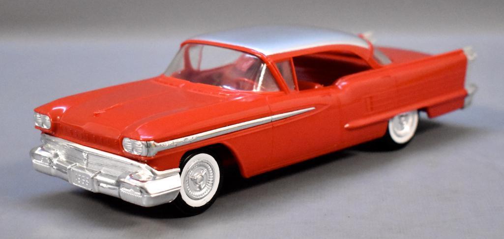 X-EL 1958 Oldsmobile Ninety Eight hardtop promo car: X-EL 1958 Oldsmobile Ninety Eight hardtop promo car Jo-Han reproduction, silver over red in excellent to near mint condition as seen in the photos.
