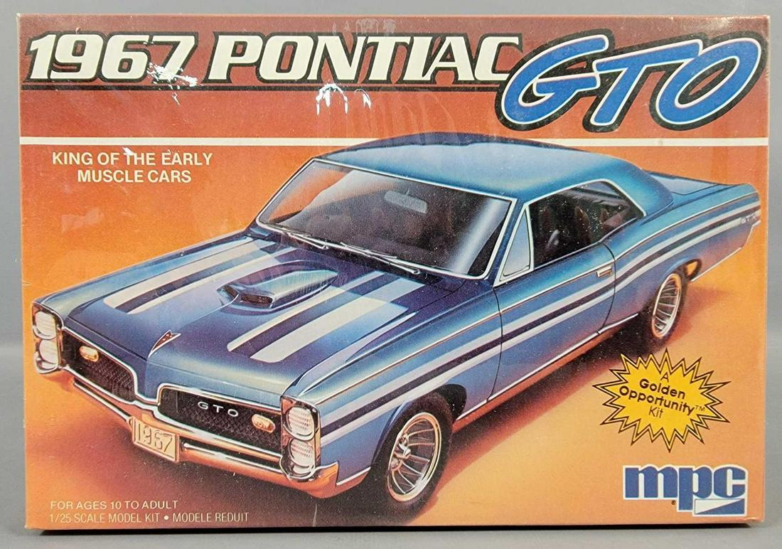 Factory sealed MPC 1967 Pontiac GTO 1/25 scale model: Factory sealed MPC 1967 Pontiac GTO 1/25 scale model kit in a near mint original box.