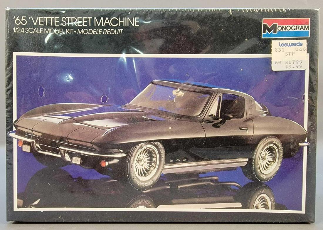 Factory sealed Monogram '65 Vette 1/24 scale model kit: Factory sealed Monogram '65 Vette street machine 1/24 scale model kit in original box, the box has wear on one corner as seen in the photos.
