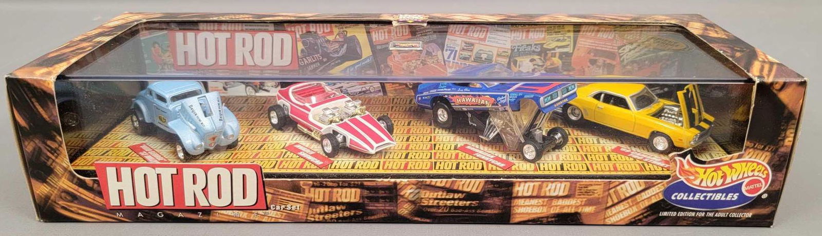 Hot Wheels 100% 24513 Hot Rod Magazine Series 4 set: Hot Wheels 100% 24513 Hot Rod Magazine Series 4 set, includes 4 mint vehicles in a near mint case with a very good original box.