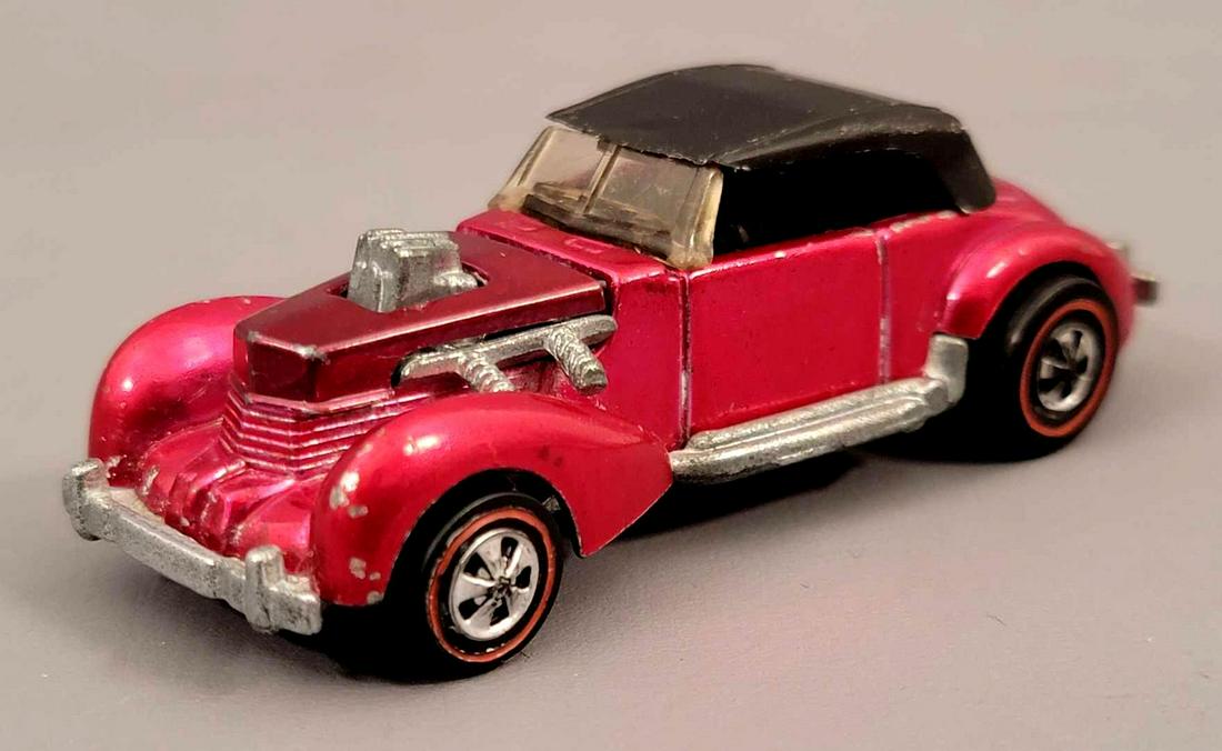 Redline Hot Wheels Rose Classic Cord Loose: Redline Hot Wheels Rose Classic Cord with original roof. Car is very good with chips and wear on both forward fenders and the front edge of the hood as seen, the hood is slightly darker than the rest 