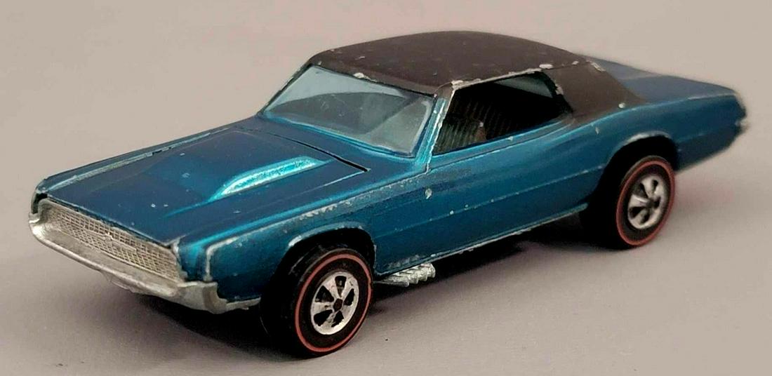 Redline Hot Wheels HK Aqua Custom T-Bird Loose dark: Redline Hot Wheels HK Aqua Custom T-Bird with darl interior. Car is clean with some scattered light hong kong roughness on the hood, light high edge wear to front fenders, a few scattered pins, light