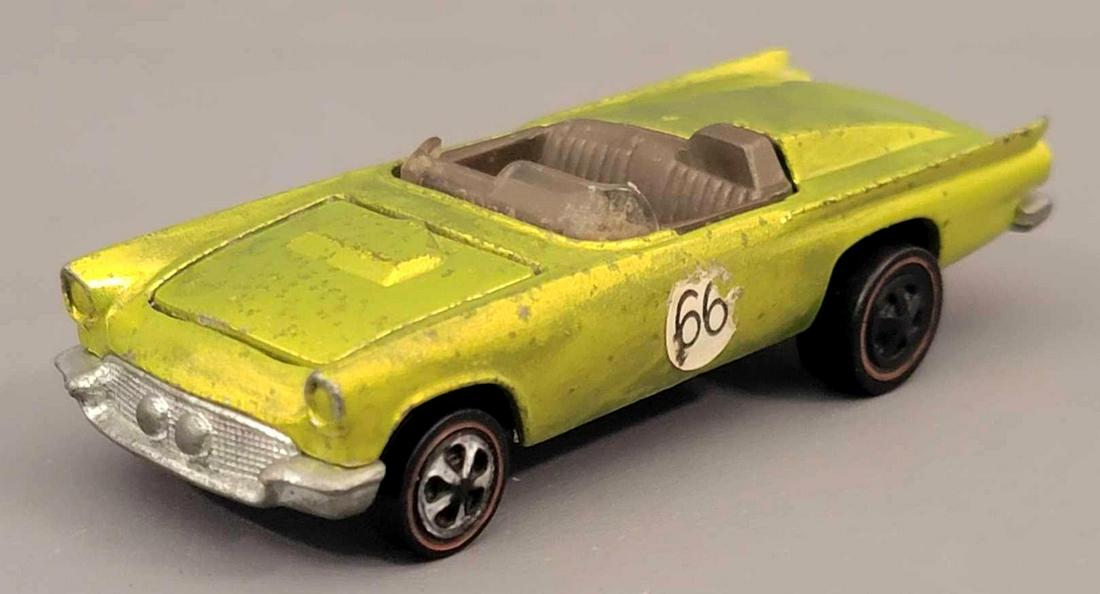 Redline Hot Wheels US Antifreeze Classic 57 Bird Loose: Redline Hot Wheels US Antifreeze Classic 57 Bird. Car is clean but has some light high edge wear along rear tail fin top edges, there is mottle tone thoughout as well. Wheels chrome is poor on 3 of th
