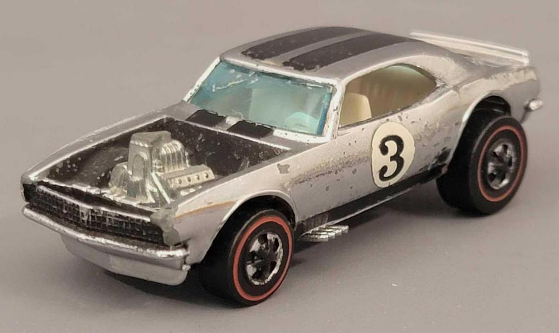 Redline Hot Wheels Chrome Club Car Heavy Chevy Loose: Redline Hot Wheels Chrome Club Car Heavy Chevy. Chrome on this car is pretty nice with some light hong kong roughness. Original roundels and stripes have wear, wheels are fair with chrome loss, excell
