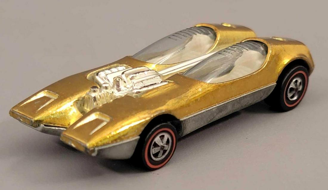 Redline Hot Wheels Gold Splittin Image Loose: Redline Hot Wheels Gold Splittin Image. Very nice paint throughout with just a hint of wear iat corners. The motor and exhaust is loose and actually cracked in one spot, wheels are ex, base is tarnish