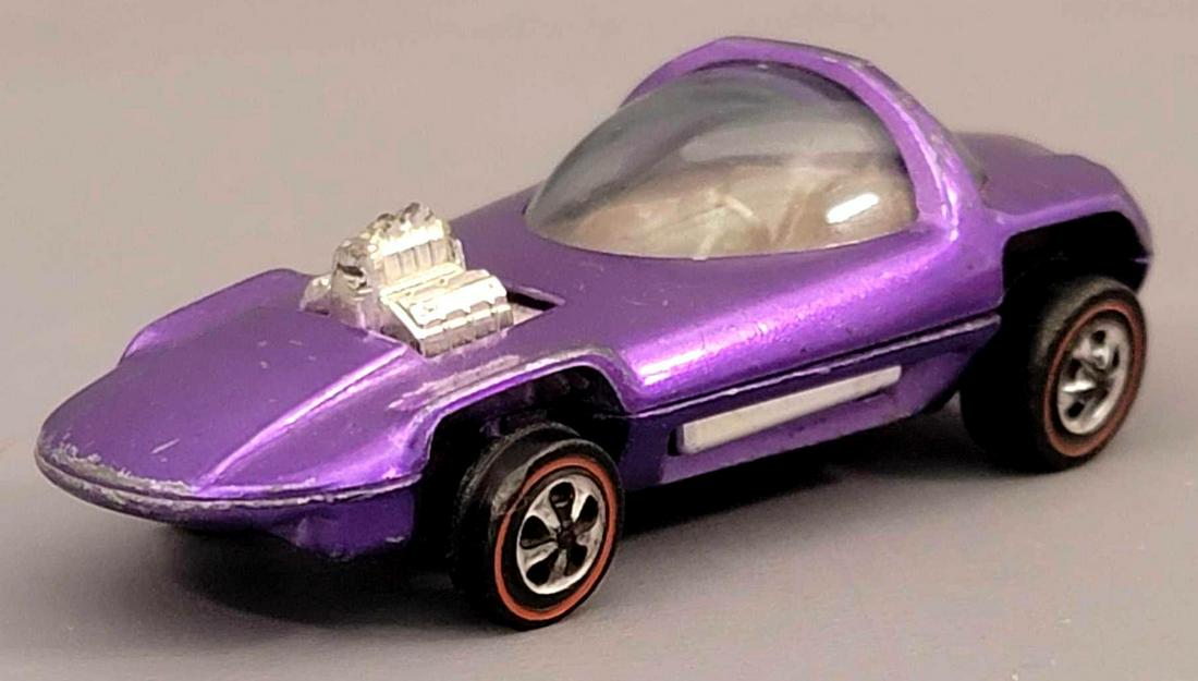 Redline Hot Wheels US Purple Silhouette Loose: Redline Hot Wheels US Purple Silhouette with champagne interior. Very nice light shade with light wear to the roll bar and front end. Wheels are nice with light wear, glass is clean. As seen in photos