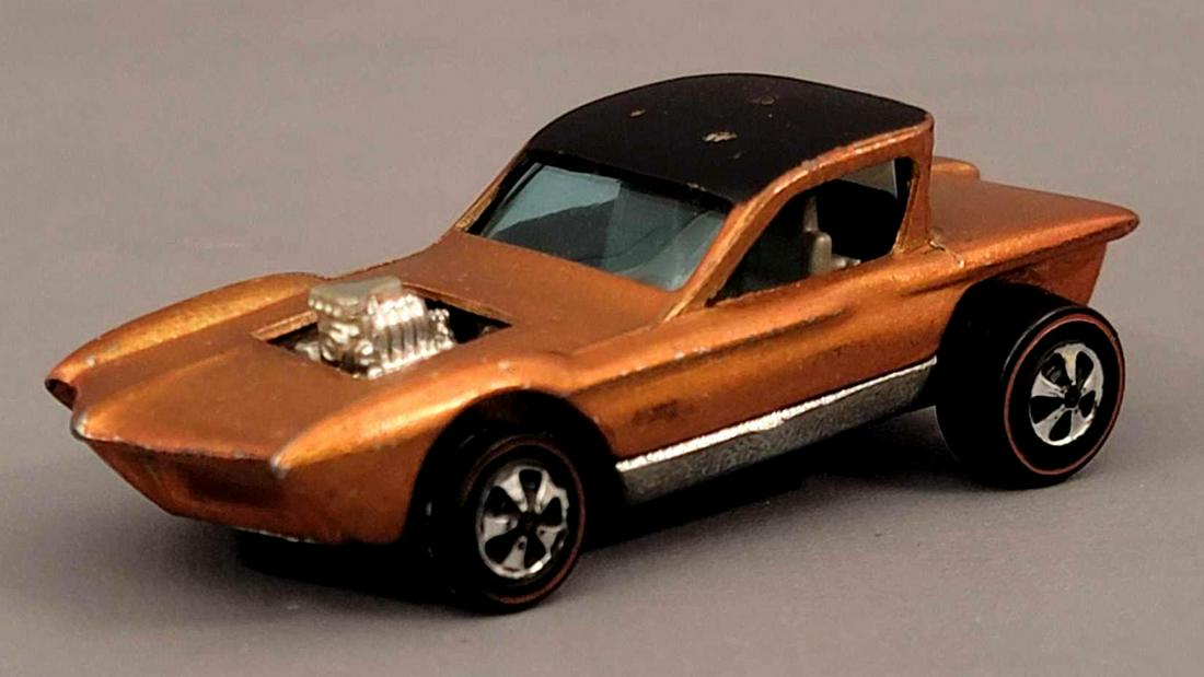 Redline Hot Wheels HK Orange Python Loose: Redline Hot Wheels HK Orange Python. Car is very nice with some very light mottle tone on the hood, roof paint is mostly complete but there are 4 nicks to the paint, excellent wheels and very clean ba
