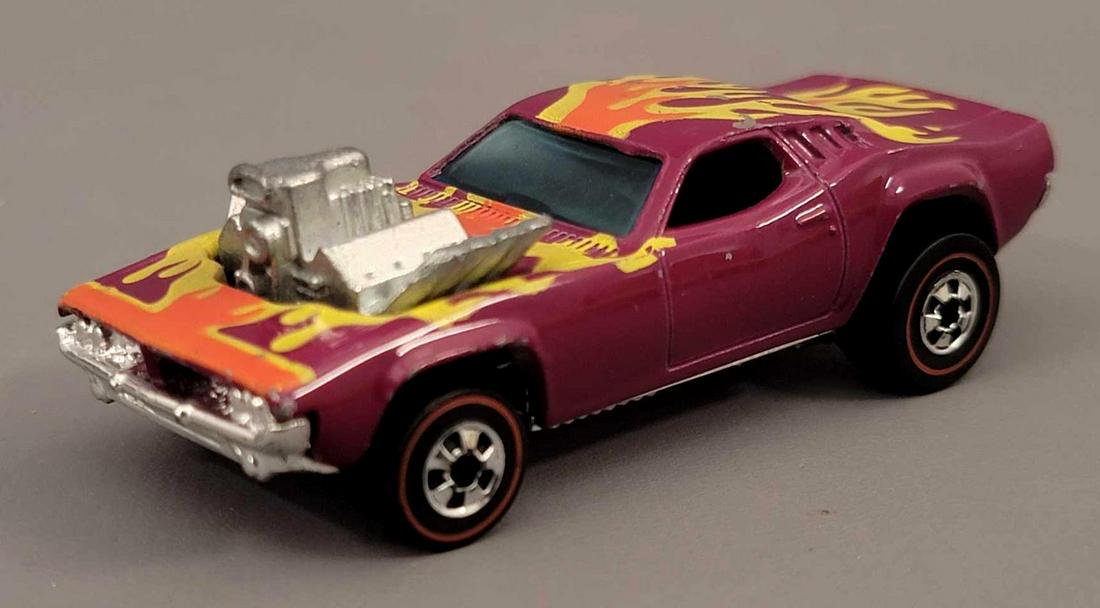 Redline Hot Wheels Roder Dodger Loose: Redline Hot Wheels Roder Dodger with chrome plastic base. Car presents well but does have 4 or 5 chips on the roof, a few other scattered as well, along with some wheel well wear in spots. Wheels are 