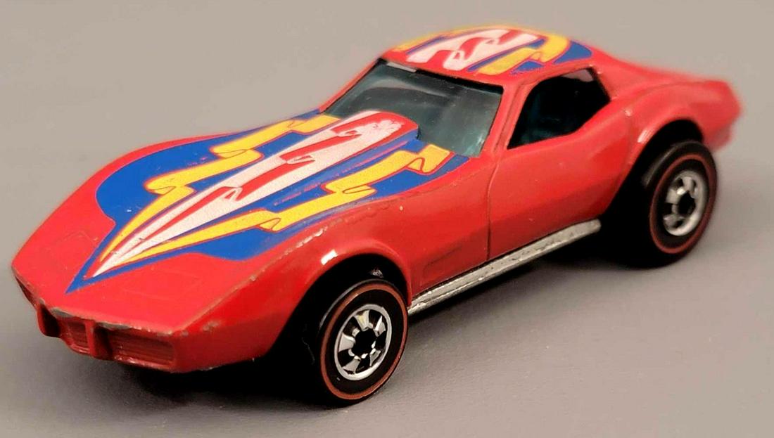 Redline Hot Wheels Red Enamel Custom Corvette Loose: Redline Hot Wheels Red Enamel Custom Corvette. Car is very clean with some light wear to front and rearm as well as some light wear on the hood tampos, wheels and base are minty. As seen in photos.