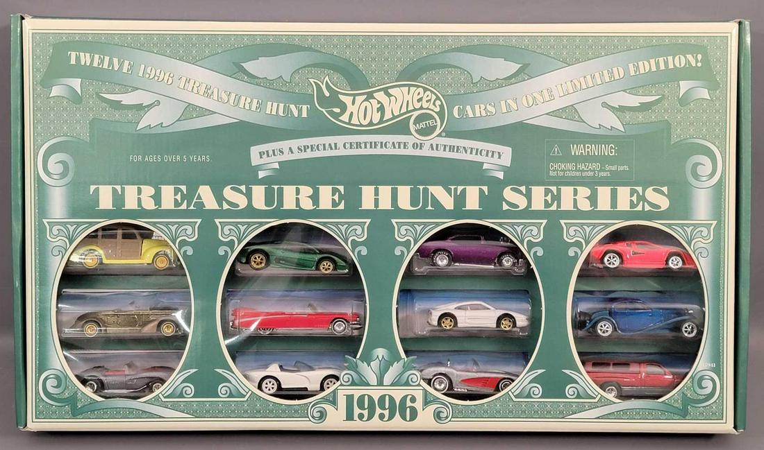 Mattel Hot Wheels 1996 Treasure Hunt set in original: Mattel Hot Wheels 1996 Treasure Hunt set in original box with shipper, mint cars with a near mint box and a nice shipping box with some graffiti on it.