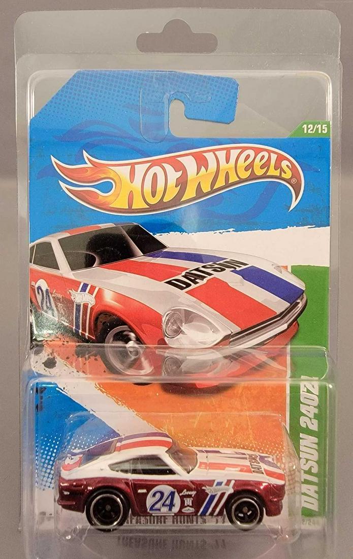 Mattel Hot Wheels Super Treasure Hunt Datsun 240Z MOC: Mattel Hot Wheels Super Treasure Hunt Datsun 240Z, 12/15, mint on a near mint card in a protecto pack.