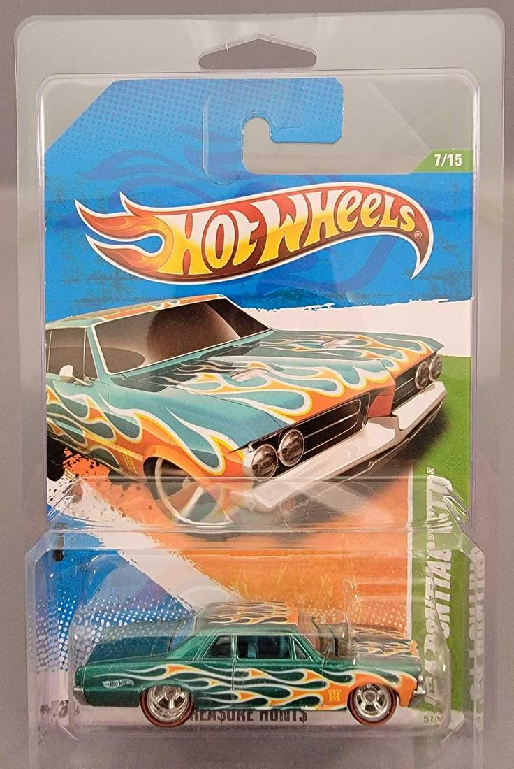 Mattel Hot Wheels 2011 Super Treasure Hunt '64 Pontiac: Mattel Hot Wheels 2011 Super Treasure Hunt '64 Pontiac GTO, mint on a near mint card in a protecto pack.