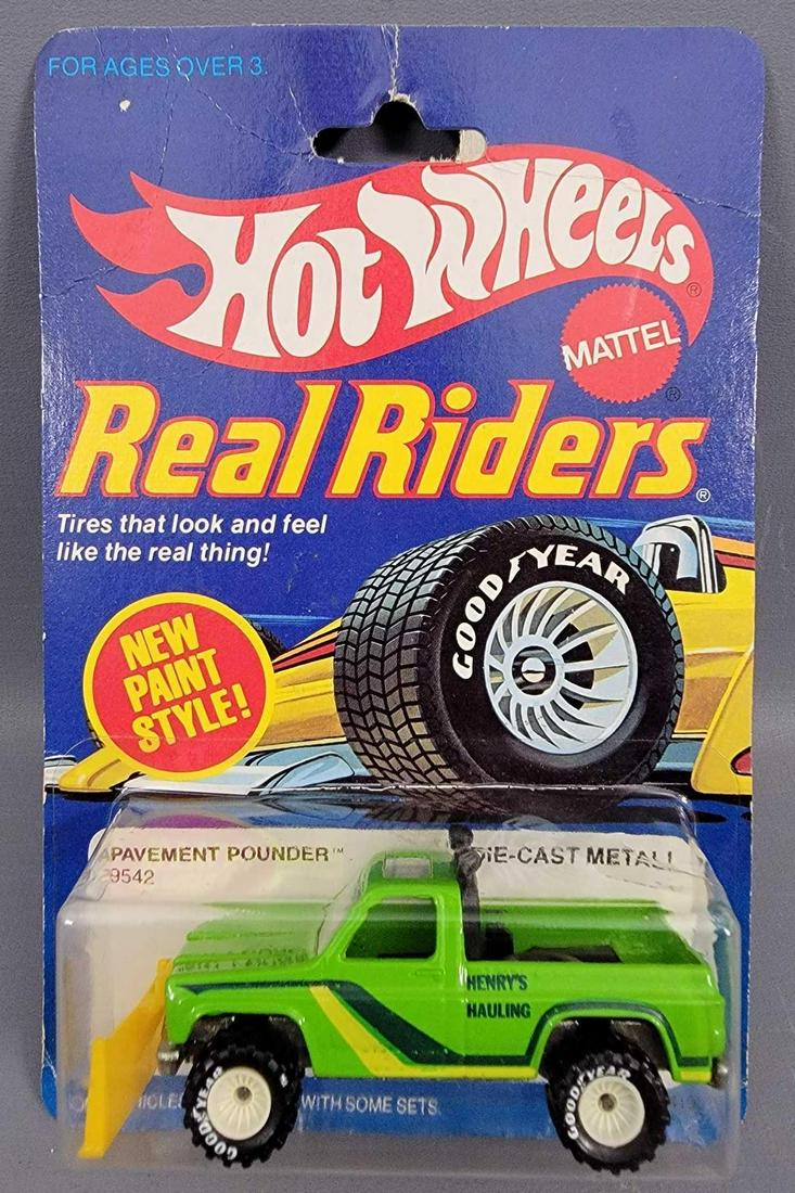 Hot Wheels Real Rider Series Green Pavement Pounder: Hot Wheels Real Rider Series Green Pavement Pounder Blister Pack. Car is minty and is the tool box version. Card is fair as it has a tear at the hang hole and creases in the upper quarter of the card.