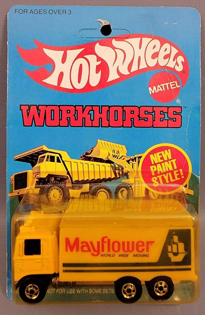 Hot Wheels Blackwall Mayflower Hiway Hauler Blister: Hot Wheels Blackwall Mayflower Hiway Hauler Blister Pack. Truck is minty on a fair Workhorses card that has a hole punch at the top and light creasing. Blister is clean, but yellowed with no cracks an