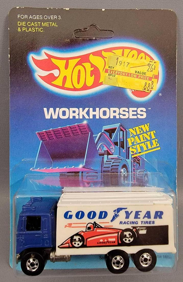 Hot Wheels Blackwall Goodyear Hiway Hauler Blister Pack: Hot Wheels Blackwall Mayflower Hiway Hauler Blister Pack. Truck is minty on a good Workhorses card that has a crease across the top. Blister is clean and clear with no cracks and is firmly attached. A