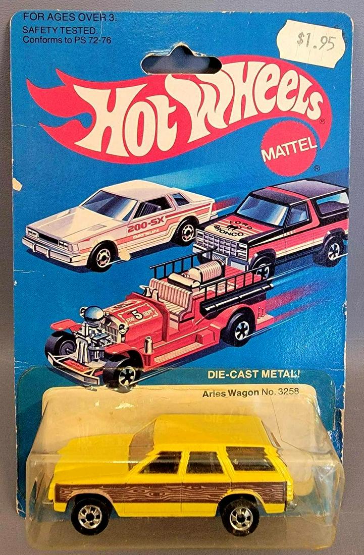 Hot Wheels Blackwall Aries Wagon Blister Pack: Hot Wheels Blackwall Aries Wagon Blister Pack. Car is minty on a fair card that has edge wear and discoloring, the blister is brittle , lightly yellowed with cracks. It is currently attached but becau