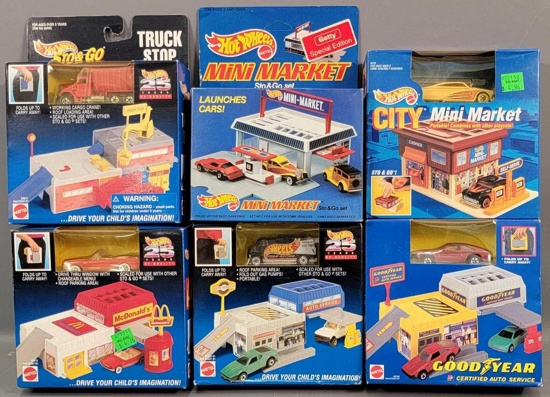 Group of 6 Hot Wheels Sto & Go sets: Group of 6 Hot Wheels Sto & Go sets. Boxes are all factory sealed. All are in very good condition or better. Group includes: 25th Anniversary McDonalds, Gas Station, Truck Stop, City Mini Market,