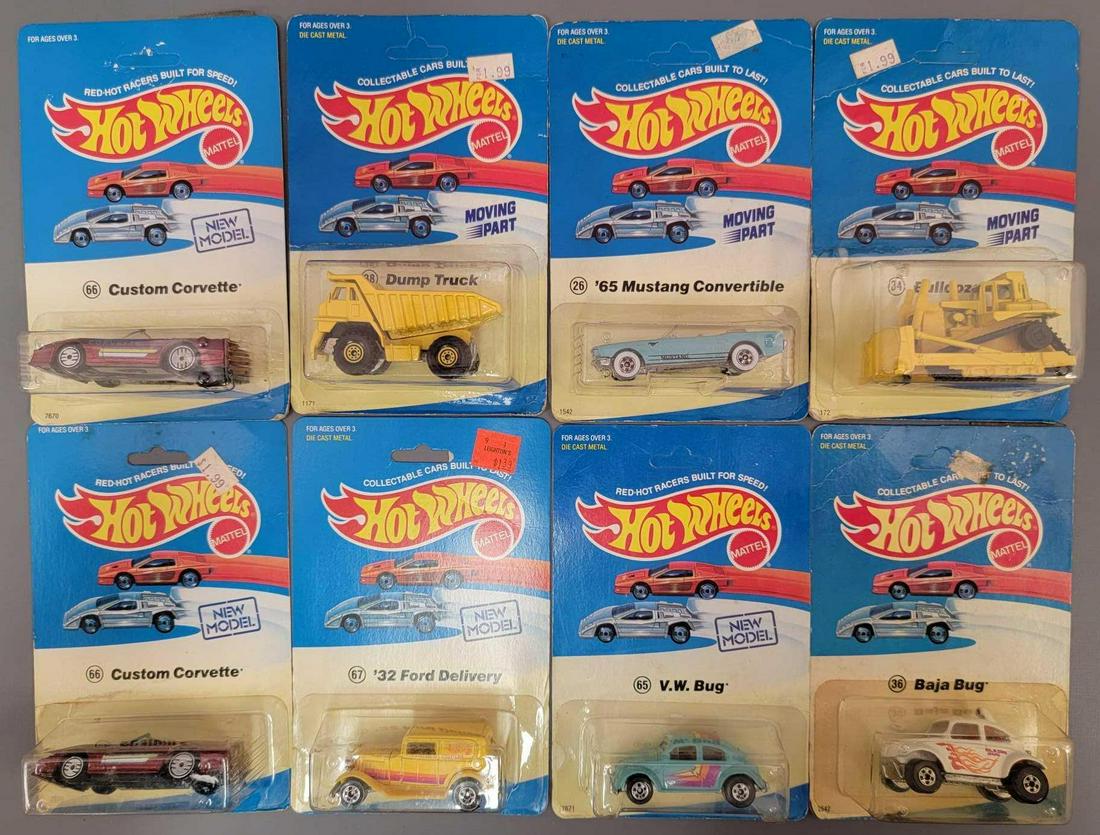 Group of 8 Hot Wheels vehicles on Experimental Cards: Group of 8 Hot Wheels vehicles on Experimental Cards . All cars are minty on fair to very good cards. Group includes: 2 Custom Corvettes, Dump Truck, '32 Ford Delivery, VW Bug, '65 Mustang Con