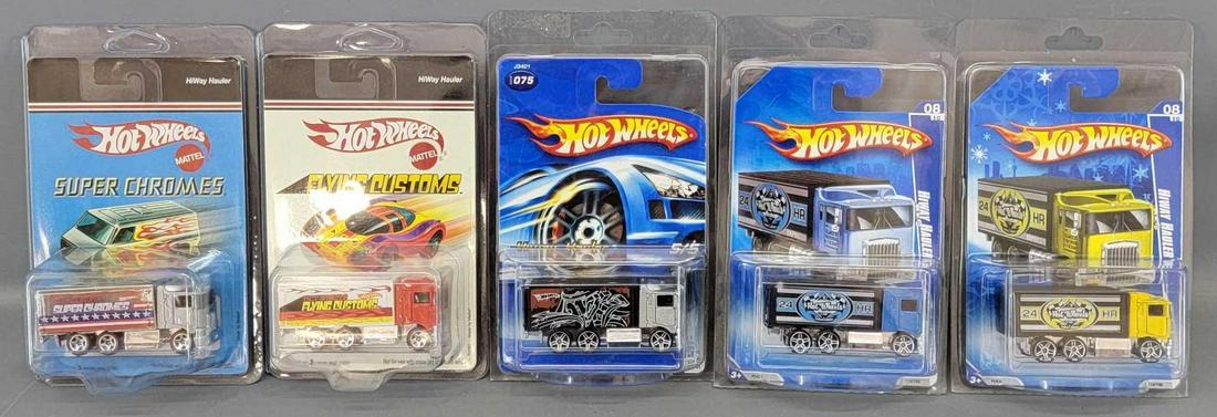 Group of 5 Hot Wheels Hiway Haulers Blister Packs: Group of 5 Hot Wheels Hiway Haulers Blister Packs. All cars are minty in very good blister packs. Trucks included are blue 24 Hour, yellow 24 Hour, Grafitti tampo, Flying Customs and Super Chromes. Al