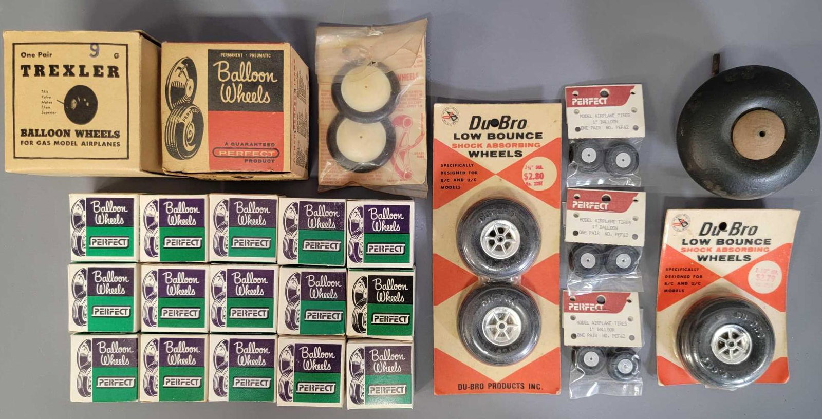 Group of mixed model airplane tires most new on cards: Group of mixed model airplane tires consisting of Perfect, Dubro, Trexler, and others, most are new on cards.