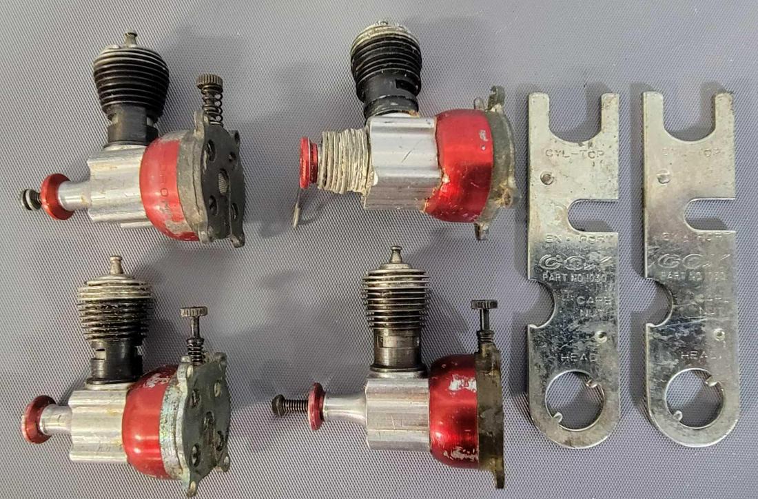 Group of four vintage .020 gas model airplane engines (1 of 4)