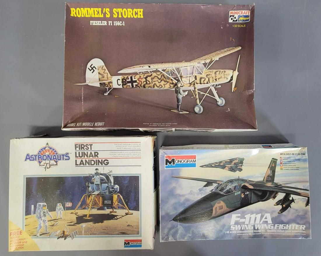Mixed group of aviation related plastic model kits: Mixed group of aviation related plastic model kits. Group includes Monogram F111A #5804, First Lunar Landing #5901, and Hasegawa Rommels Storch #1141. All kits appear complete but were not inventoried