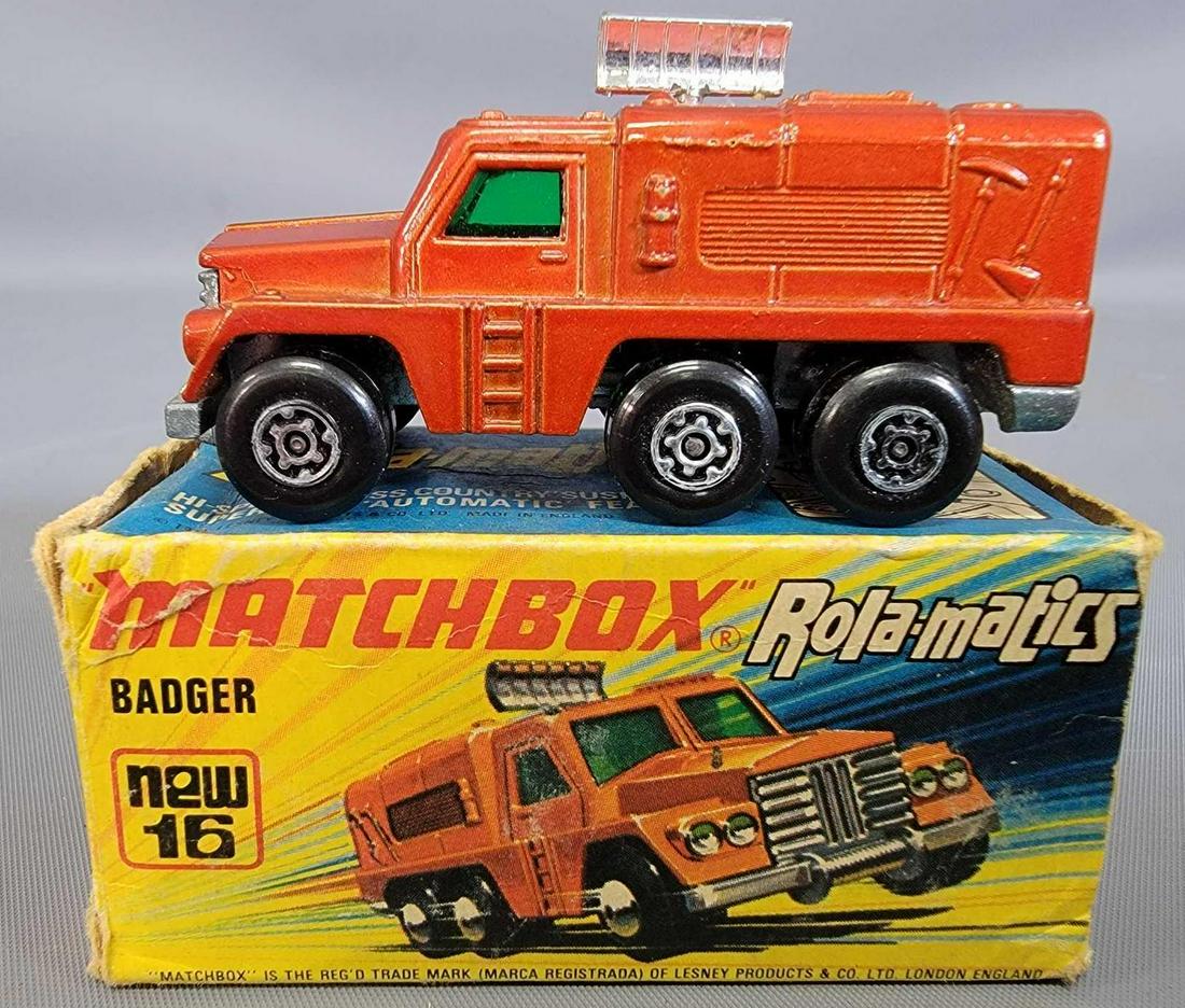 Matchbox Rollamatics #16 Badger with Chrome radar in: Matchbox Rollamatics #16 Badger with Chrome radar in original box. Car is minty in a fair box that has end flap creases and wear and a small stain on the edge of one side panel. As seen in the photos.