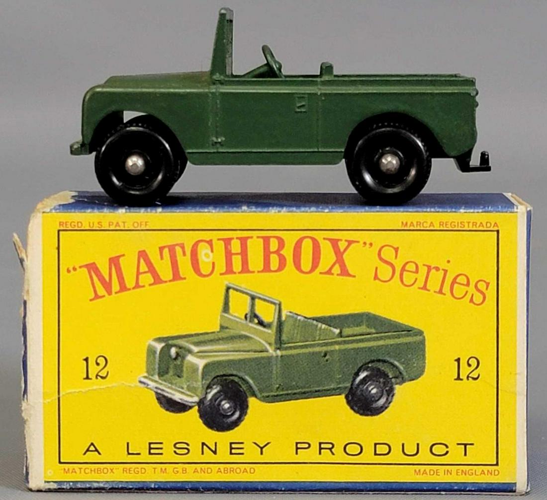Lesney Matchbox #12 Military Land Rover in original box: Lesney Matchbox #12 Military Land Rover in original box. Car is wear mint with just a bit of wear to front end silver paint, box is rough with one end flap completely missing. As seen in the photos.