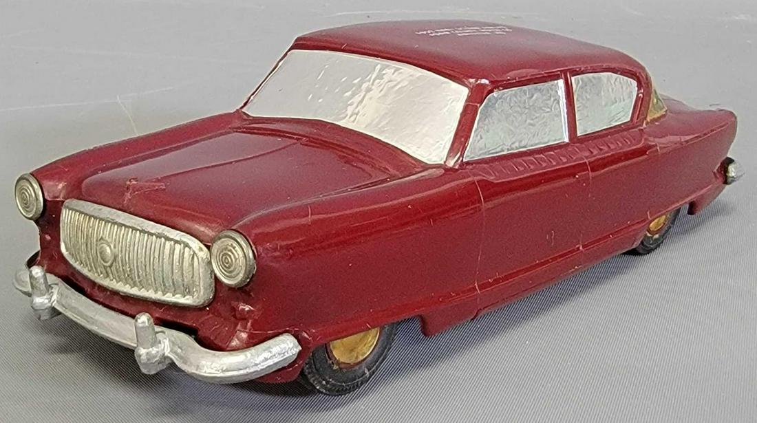 1952 Nash Friction Sedan in Red With Roof Logo by (1 of 8)