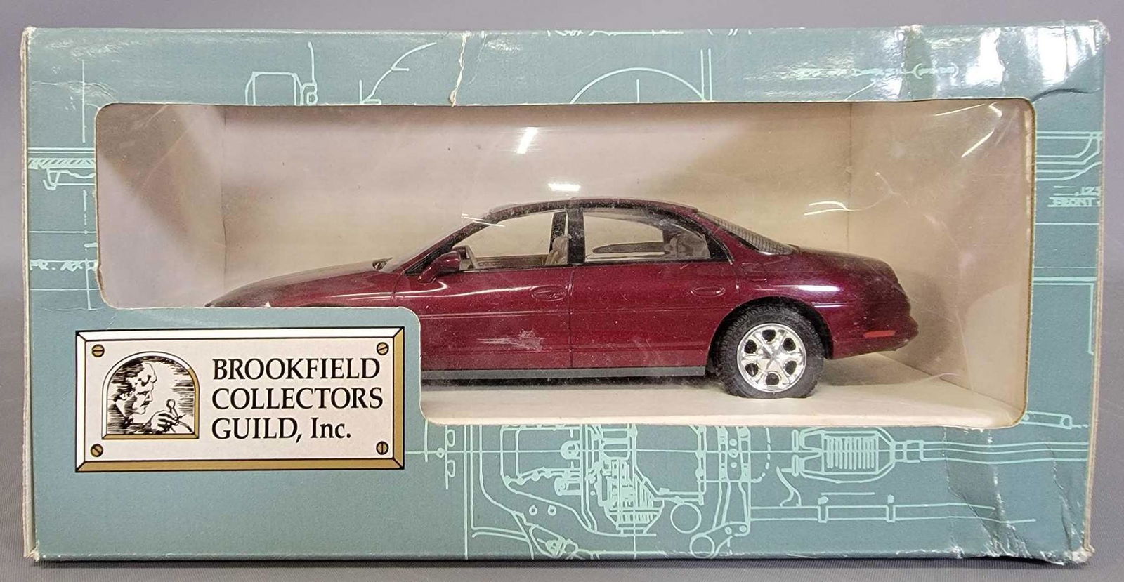 1995 Oldsmobile Aurora Maroon Promo Car By Brookfield: 1995 Oldsmobile Aurora Maroon Promo Car By Brookfield with the Original Box. Car is as new and mint and has both mirrors without repairs. Box has some crush damage on the right lower front corner.