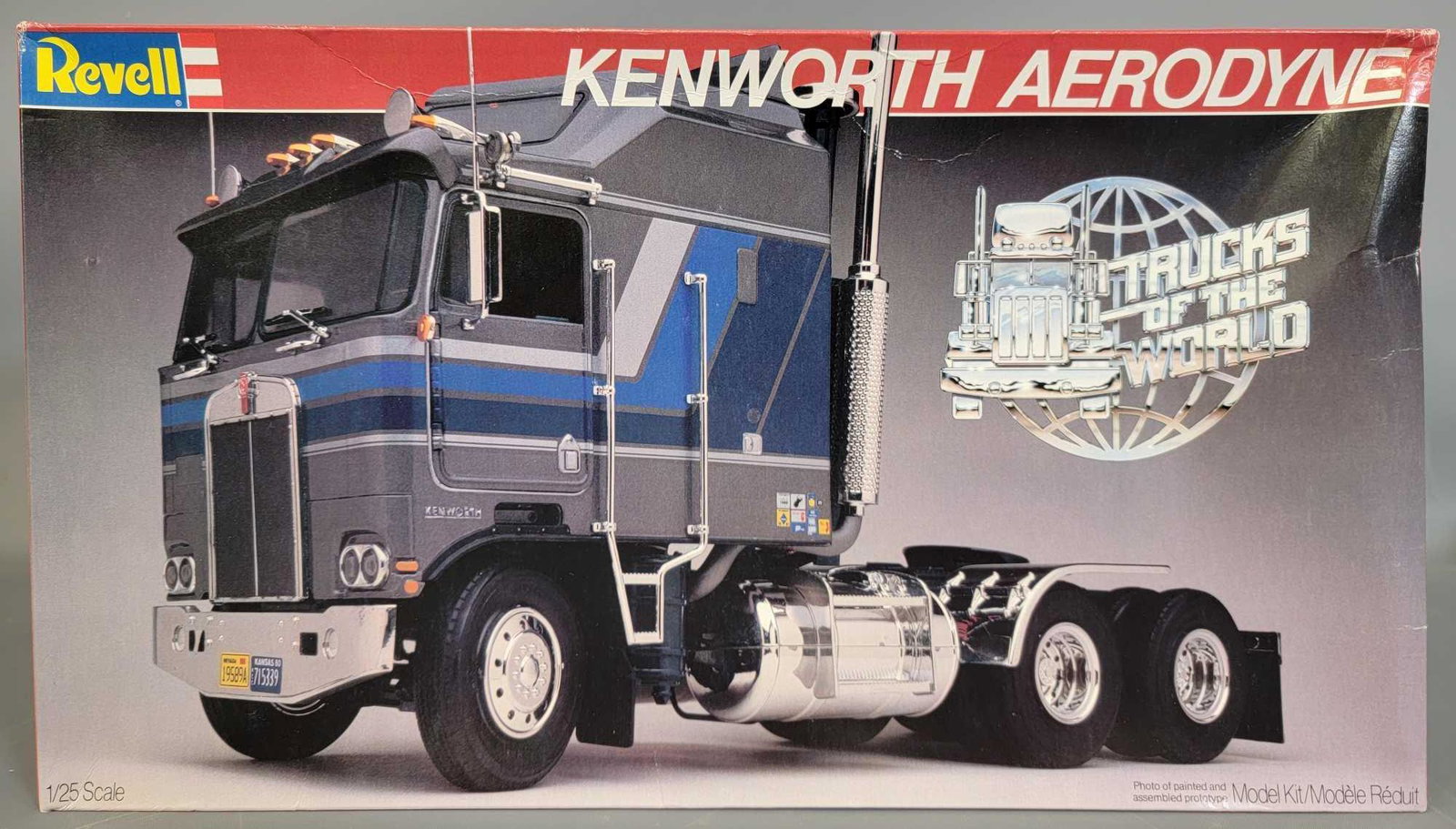 Unbuilt Revell Kenworth Aerodyne Trucks of the World: Revell Kenworth Aerodyne Trucks of the World 1:25 scale model kit 7413. Unbuilt kit, box is good with medium to heavy cupping to the lid, cab has broken windshield post, original plastic wrap has brok