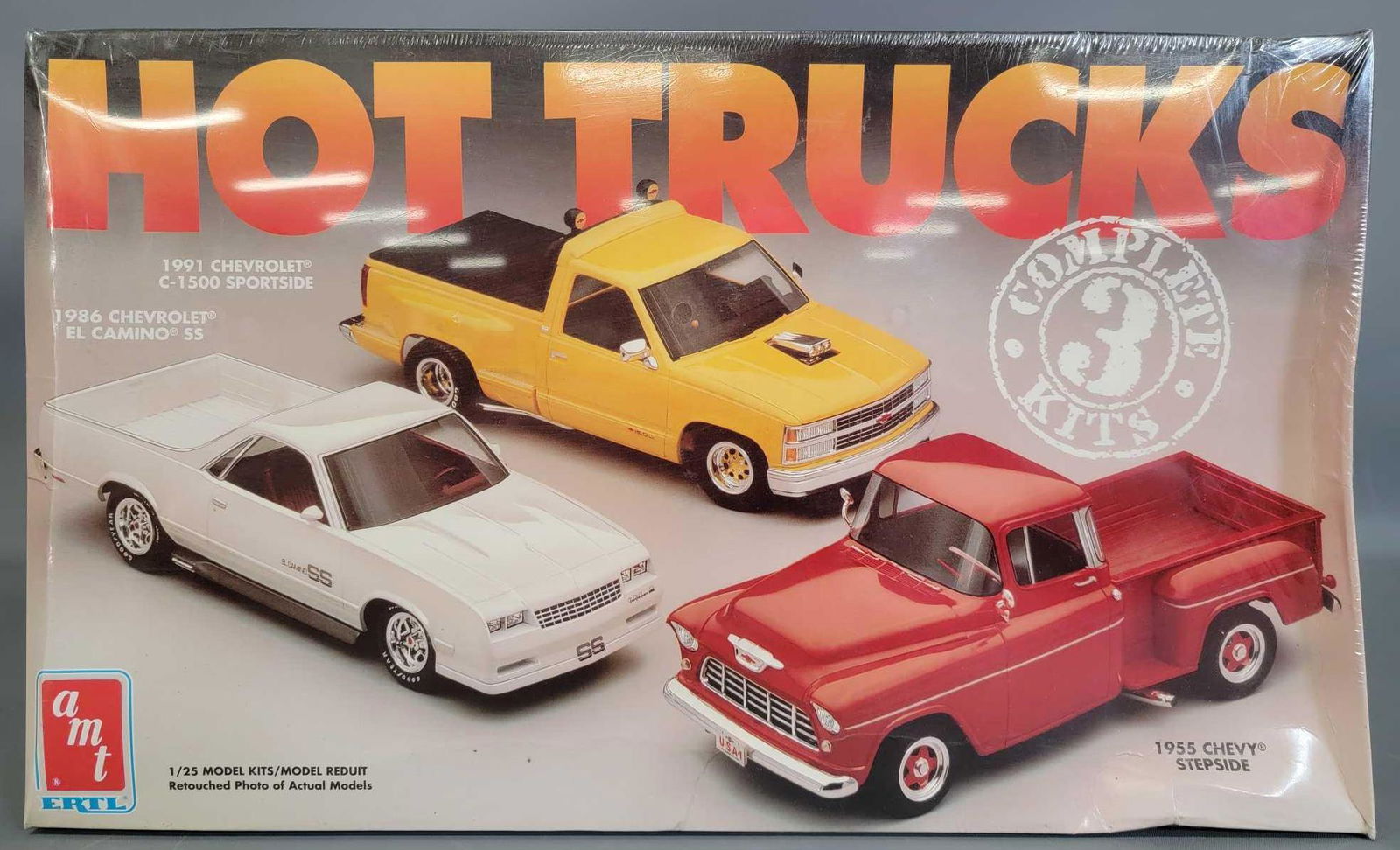 Factory sealed AMT ERTL Hot Trucks 1:25 scale model kit: Factory sealed AMT ERTL Hot Trucks 1:25 scale model kit 8911. Box is fair due to it having extreme cupping on all sides from the wrap shrinking, the wrap is intact with no tears, as seen in the photos