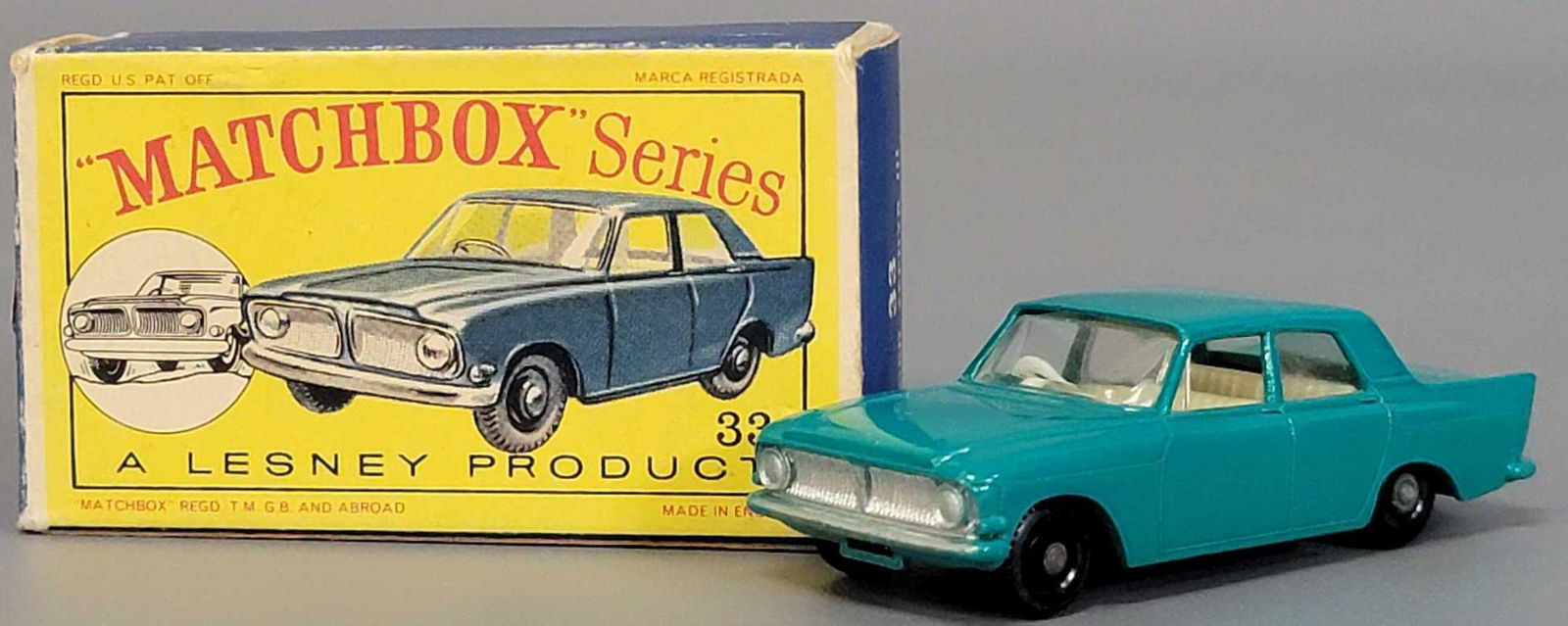 Lesney Matchbox 33 Ford Zephyr III in original D series: Lesney Matchbox 33 Ford Zephyr III in original D series box. Car is near mint with black wheels, the box is very good with some creases on the side panels.