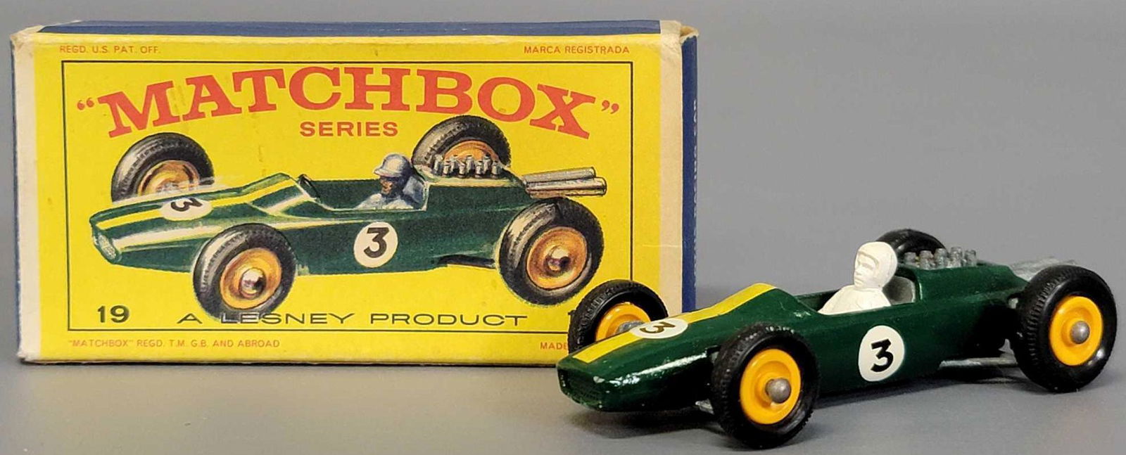 Lesney Matchbox Green 19 Lotus Racing Car in original D: Lesney Matchbox Green 19 Lotus Racing Car in original D series box. Car is near mint except the hubs have shrunk, so wheels are loose, the box is good with some creases in side panels.