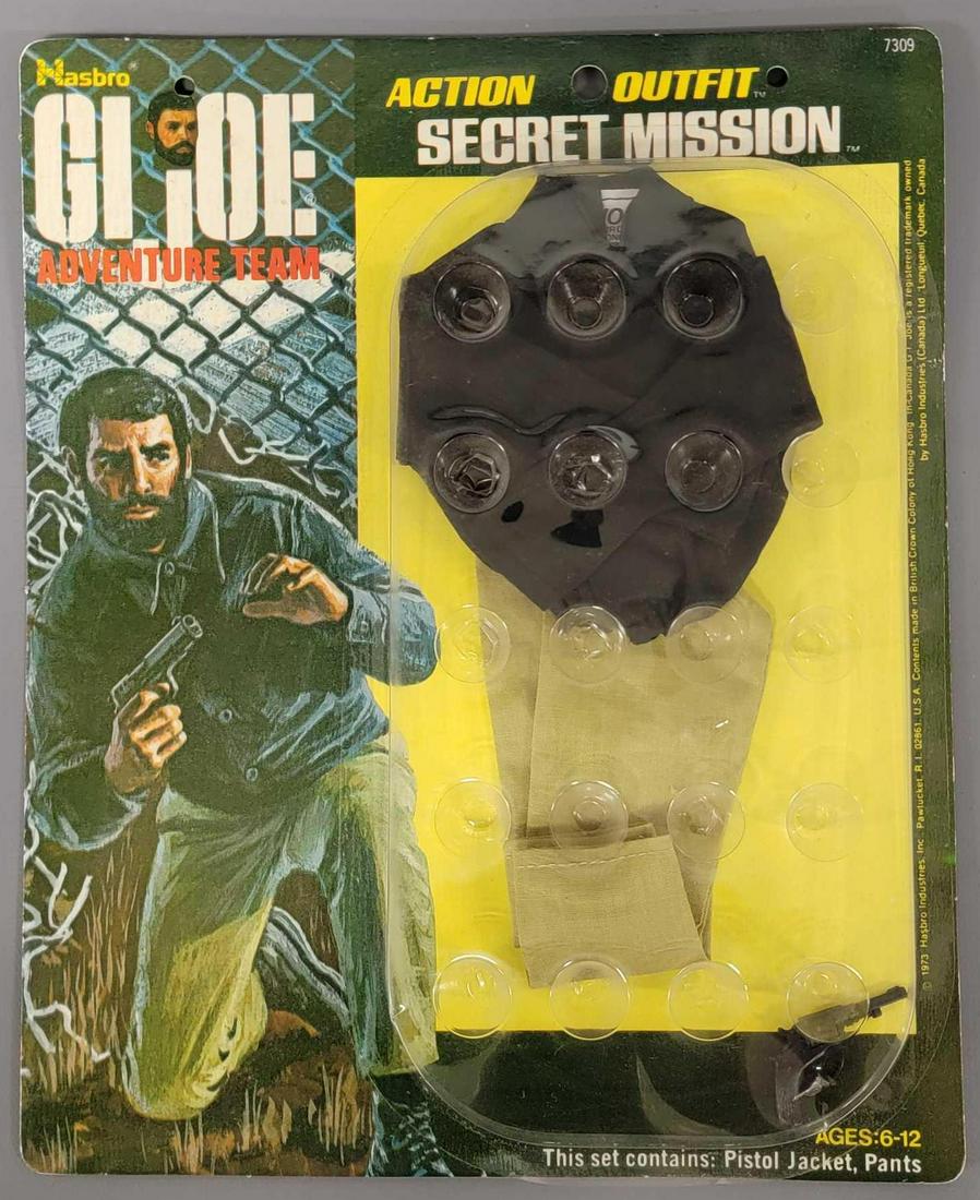 Mint 1973 Hasbro GI Joe AT Adventure Team 7309 secret: Mint 1973 Hasbro GI Joe AT Adventure Team 7309 secret mission outfit, mint on a sealed blister card. includes pants, shirt and all black revolver, mint items on a near mint card as seen in the photos.