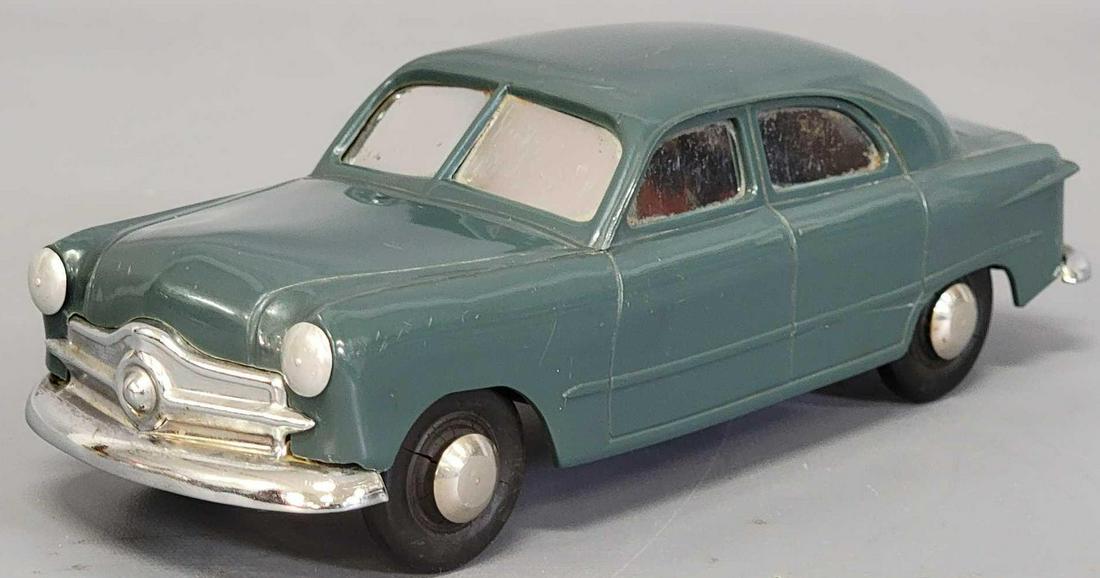 1949 Dark green Ford 4 door sedan wind up dealer promo: 1949 Dark Green Ford 4 door sedan wind up promo car. Car is in good condition with light wear throughout, it does have light dirt accumulation in areas and will clean up nicer, original rubber tires a