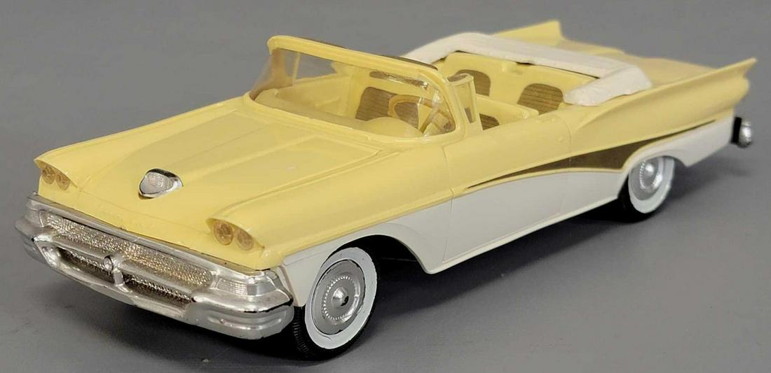 1958 AMT two tone yellow & white Ford Fairlane 500: 1958 AMT two tone yellow & white Ford Fairlane 500 Convertible friction promo car. Car is excellent plus with some very minor wear to paint on bumpers and a small factory blemish on the drivers si