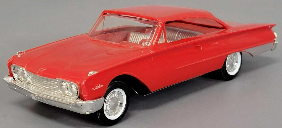 1960 AMT red Ford Starliner 2 door Hardtop friction: AMT red Ford Starliner 2 door Hardtop friction promo car. Car is excellent with no warping or scratches, but it has both front turn signal hood mounts partially missing, only a few small spots of chro