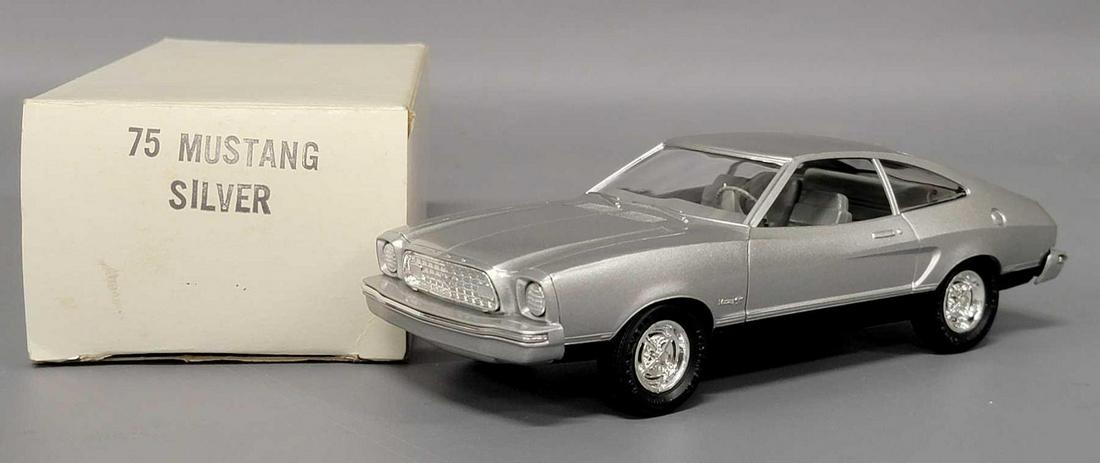1975 silver Ford Mustang II dealer promo car in: 1975 silver Ford Mustang II dealer promo car in original box. Car is near mint with no issues. Box is solid with normal shelf wear. Sold as-is as seen in photos with no returns.